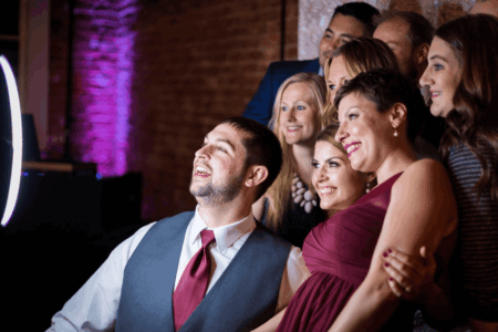 Photo booth guests pose for a photo at the Reed Ballroom in Salem Oregon