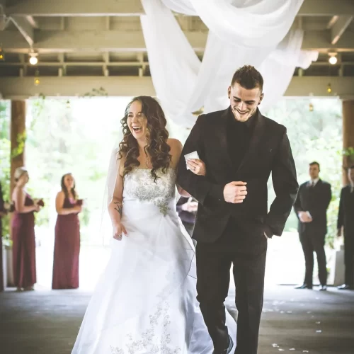 Happily entering in the venue where the bride and groom day starts their special day